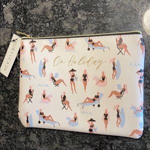 Never used! “On Holiday” clutch with tags!